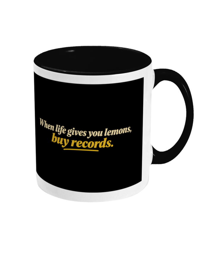 No Lemons Records mug — cream and gold slogan on the black reverse side